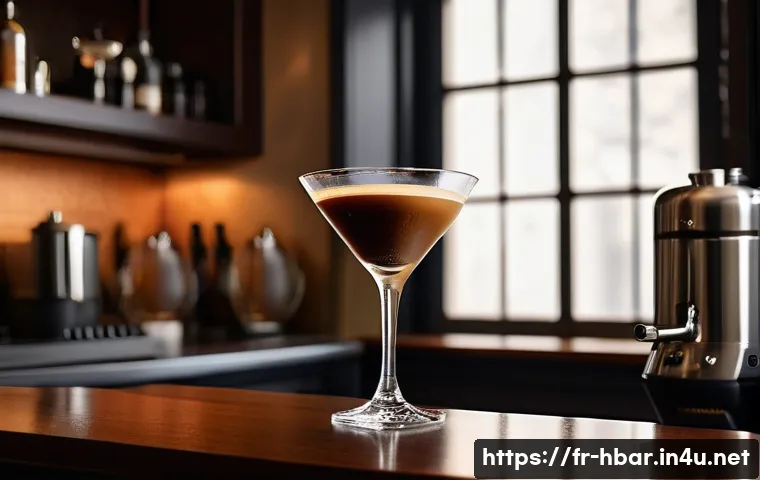 홈바텐더 커피 칵테일 레시피 - A sophisticated home bar scene featuring a freshly prepared Espresso Martini cocktail in a sleek mar...